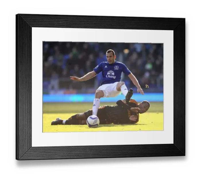 Framed Print : Heitinga vs. Drogba: Everton vs. Chelsea's Intense FA Cup Fourth Round Battle at Goodison Park