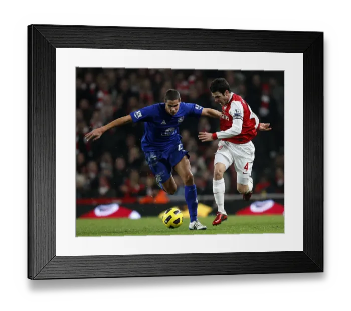 Framed Print : Battle for the Ball: Rodwell vs. Fabregas - Arsenal vs. Everton, Premier League Rivalry (February 2011) Framed Print : Battle for the Ball: Rodwell vs. Fabregas - Arsenal vs. Everton, Premier League Rivalry (February 2011)