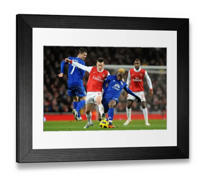 Framed Print : Battle for the Ball: Saha vs. Koscielny - Arsenal vs. Everton, Premier League (2011) Framed Print : Battle for the Ball: Saha vs. Koscielny - Arsenal vs. Everton, Premier League (2011)