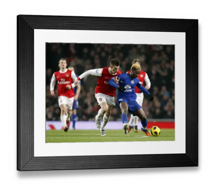 Framed Print : Battle for the Ball: Koscielny vs. Saha - Arsenal vs. Everton, Premier League Rivalry (February 2011) Framed Print : Battle for the Ball: Koscielny vs. Saha - Arsenal vs. Everton, Premier League Rivalry (February 2011)