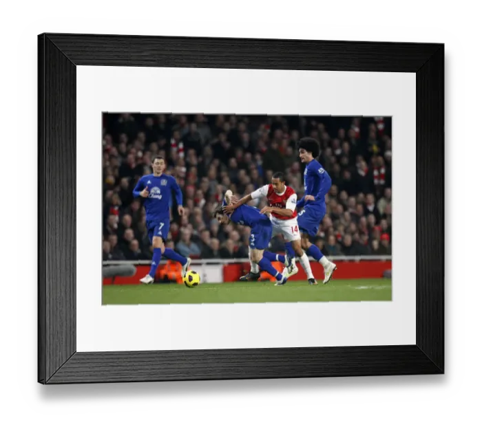 Framed Print : Intense Rivalry: Walcott vs. Baines - Arsenal vs. Everton, Premier League Showdown (February 2011)