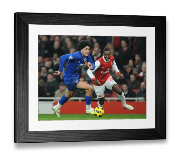 Framed Print : Intense Battle for Ball Possession: Fellaini vs. Djourou - Arsenal vs. Everton, Barclays Premier League (February 2011)