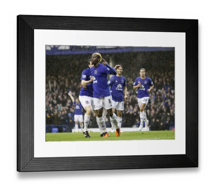 Framed Print : Mikel Arteta Grins as Louis Saha Scores: Everton's Thrilling Premier League Win over Blackpool (05 February 2011)