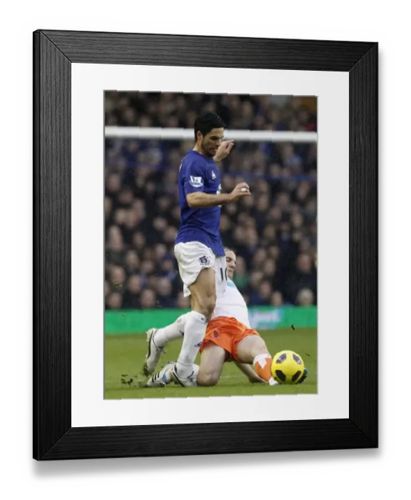 Framed Print : Intense Battle: Mikel Arteta vs. David Vaughan at Goodison Park - Everton vs. Blackpool, Barclays Premier League (2011) Framed Print : Intense Battle: Mikel Arteta vs. David Vaughan at Goodison Park - Everton vs. Blackpool, Barclays Premier League (2011)