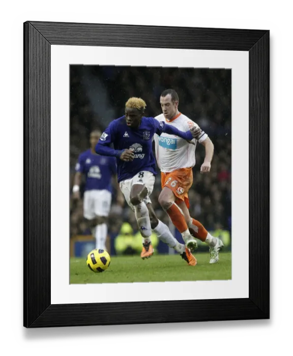Framed Print : Saha vs. Adam: A Premier League Battle at Goodison Park - Everton vs. Blackpool (February 2011)