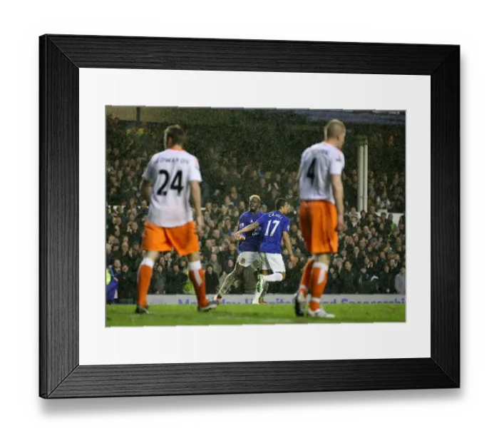 Framed Print : Everton's Louis Saha in Triumphant Celebration After Scoring the Third Goal Against Blackpool (05 February 2011)
