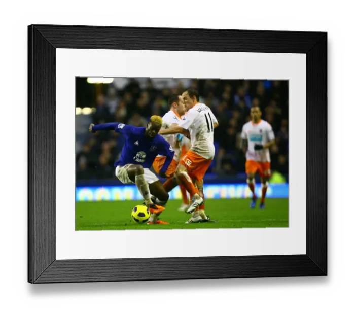 Framed Print : Battle for the Ball: Saha vs. Vaughan - Everton vs. Blackpool, Premier League (2011)
