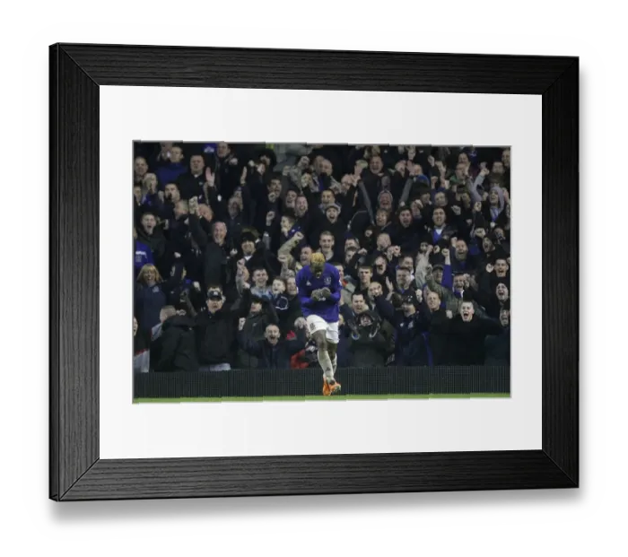 Framed Print : Everton's Louis Saha: Triumphant Three-Goal Blitz Against Blackpool (05.02.2011) Framed Print : Everton's Louis Saha: Triumphant Three-Goal Blitz Against Blackpool (05.02.2011)