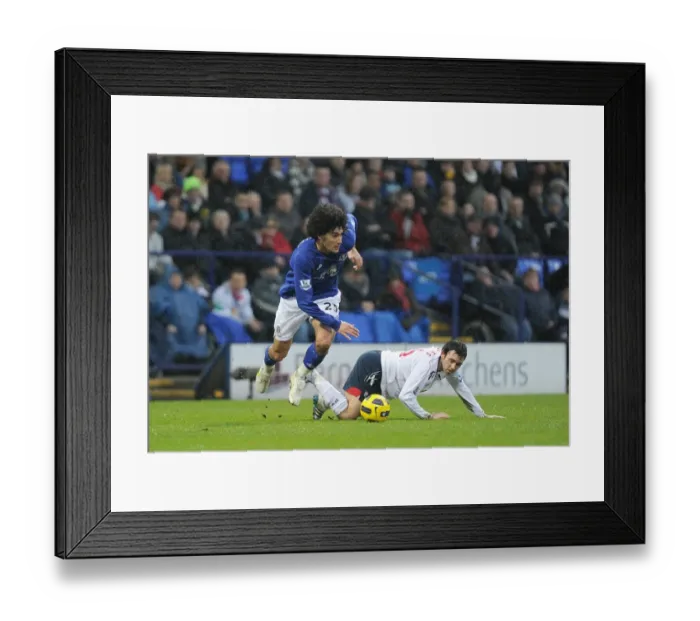 Framed Print : Intense Rivalry: Fellaini vs. Davies Battle at Reebok Stadium - Everton vs. Bolton Wanderers (BPL, 13 February 2011) Framed Print : Intense Rivalry: Fellaini vs. Davies Battle at Reebok Stadium - Everton vs. Bolton Wanderers (BPL, 13 February 2011)