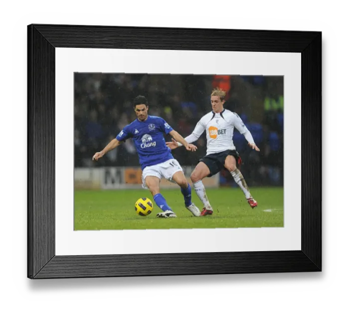 Framed Print : Mikel Arteta vs. Stuart Holden: A Premier League Showdown at Reebok Stadium (13 February 2011) Framed Print : Mikel Arteta vs. Stuart Holden: A Premier League Showdown at Reebok Stadium (13 February 2011)