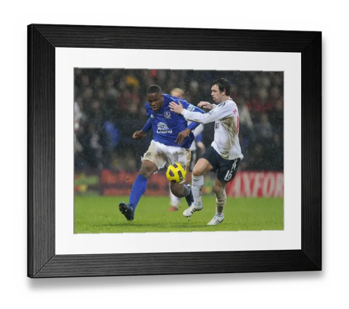 Framed Print : Intense Rivalry: Anichebe vs. Davies at Reebok Stadium - Everton vs. Bolton Wanderers, Barclays Premier League (13 February 2011) Framed Print : Intense Rivalry: Anichebe vs. Davies at Reebok Stadium - Everton vs. Bolton Wanderers, Barclays Premier League (13 February 2011)