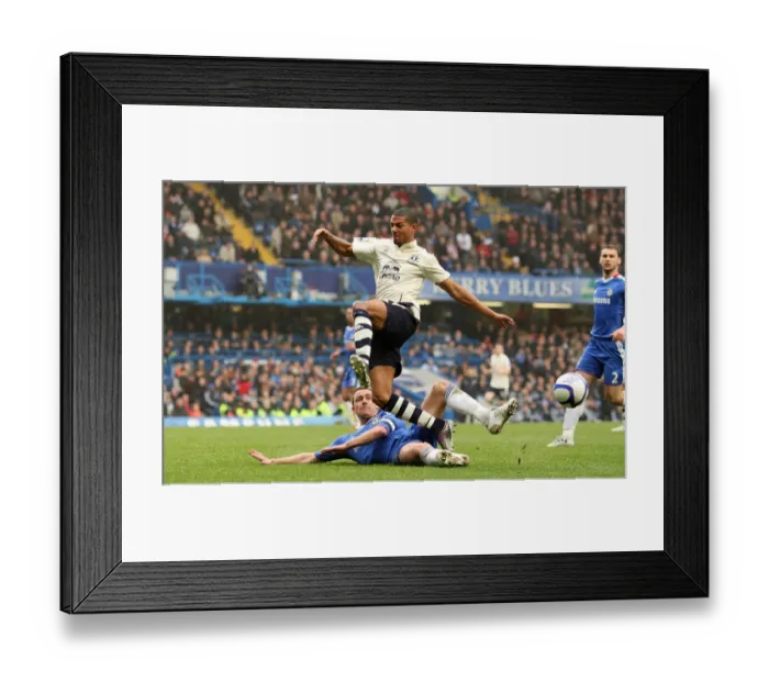Framed Print : Jermaine Beckford vs John Terry: A FA Cup Battle at Stamford Bridge - Everton's Determined Forward Takes on Chelsea's Defensive Legend (Fourth Round Replay, 19 February 2011) Framed Print : Jermaine Beckford vs John Terry: A FA Cup Battle at Stamford Bridge - Everton's Determined Forward Takes on Chelsea's Defensive Legend (Fourth Round Replay, 19 February 2011)