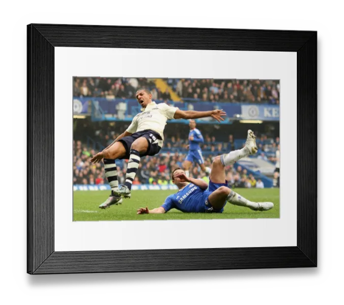 Framed Print : Everton's Jermaine Beckford vs Chelsea's John Terry: A FA Cup Battle at Stamford Bridge - Determined Striker vs Defiant Captain (February 19, 2011) Framed Print : Everton's Jermaine Beckford vs Chelsea's John Terry: A FA Cup Battle at Stamford Bridge - Determined Striker vs Defiant Captain (February 19, 2011)