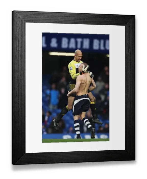 Framed Print : Everton's Glory: Tim Howard and Johnny Heitinga Celebrate FA Cup Victory at Stamford Bridge (19 February 2011) Framed Print : Everton's Glory: Tim Howard and Johnny Heitinga Celebrate FA Cup Victory at Stamford Bridge (19 February 2011)