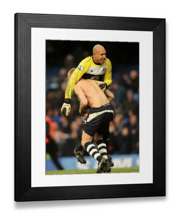 Framed Print : Celebrating Glory: Heitinga and Howard's FA Cup Upset Victory Jubilation at Stamford Bridge (19 February 2011) Framed Print : Celebrating Glory: Heitinga and Howard's FA Cup Upset Victory Jubilation at Stamford Bridge (19 February 2011)