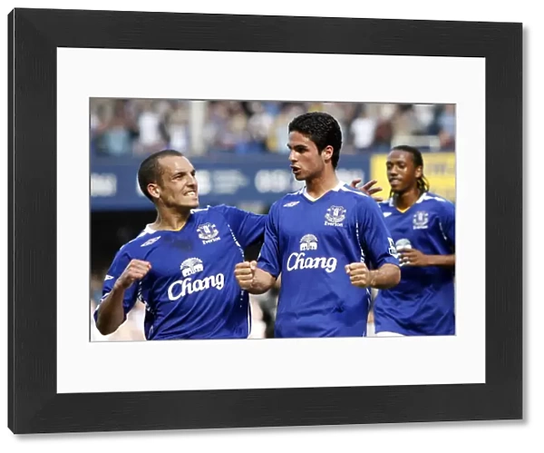 Everton's Mikel Arteta and Leon Osman: A Celebration of Goalscoring Glory (vs Portsmouth)