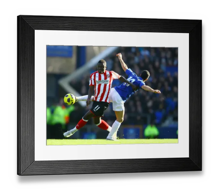 Framed Print : Battle for the Ball: Mikel Arteta vs. Sulley Muntari - Everton vs. Sunderland, Premier League, Goodison Park (2011) Framed Print : Battle for the Ball: Mikel Arteta vs. Sulley Muntari - Everton vs. Sunderland, Premier League, Goodison Park (2011)