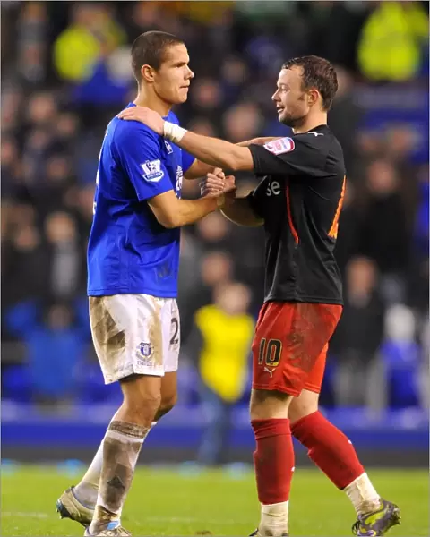 Everton's Jack Rodwell and Noel Hunt of Reading: United in FA Cup Fifth Round Aftermath (01.03.2011)