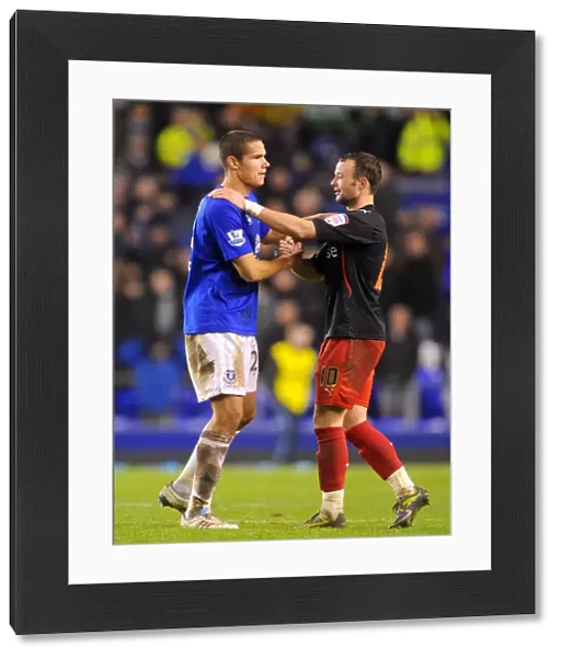Everton's Jack Rodwell and Noel Hunt of Reading: United in FA Cup Fifth Round Aftermath (01.03.2011)
