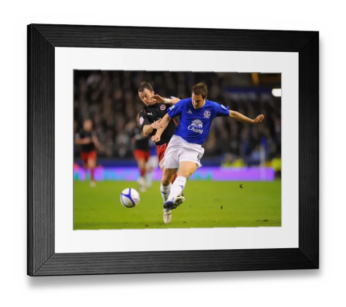 Framed Print : Battle for the Ball: Jagielka vs. Hunt - Everton's FA Cup Fifth Round Clash (01 March 2011) Framed Print : Battle for the Ball: Jagielka vs. Hunt - Everton's FA Cup Fifth Round Clash (01 March 2011)