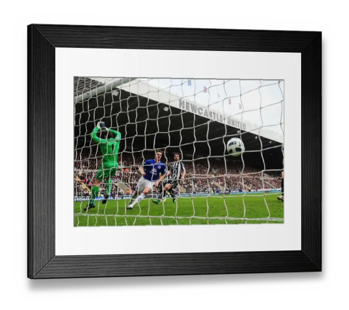 Framed Print : Evertons Phil Jagielka scores their second goal during the Barclays Premier League match at St James Park, Newcastle Framed Print : Evertons Phil Jagielka scores their second goal during the Barclays Premier League match at St James Park, Newcastle