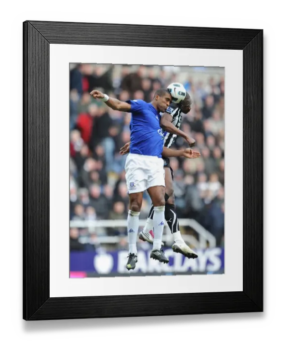 Framed Print : Intense Battle: Distin vs Ameobi at St. James Park - Everton vs Newcastle United, Barclays Premier League (2011) Framed Print : Intense Battle: Distin vs Ameobi at St. James Park - Everton vs Newcastle United, Barclays Premier League (2011)
