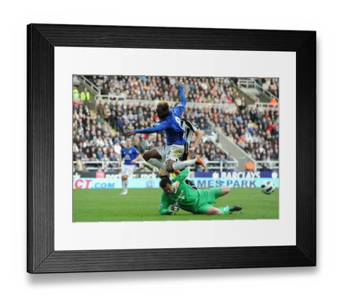 Framed Print : Clash at St. James Park: Louis Saha vs. Steve Harper - Everton vs. Newcastle United (05 March 2011) Framed Print : Clash at St. James Park: Louis Saha vs. Steve Harper - Everton vs. Newcastle United (05 March 2011)