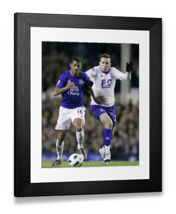 Framed Print : Clash at Goodison Park: Jermaine Beckford vs Jordan Mutch - Premier League Battle (Everton vs Birmingham City, 09 Mar 2011) Framed Print : Clash at Goodison Park: Jermaine Beckford vs Jordan Mutch - Premier League Battle (Everton vs Birmingham City, 09 Mar 2011)