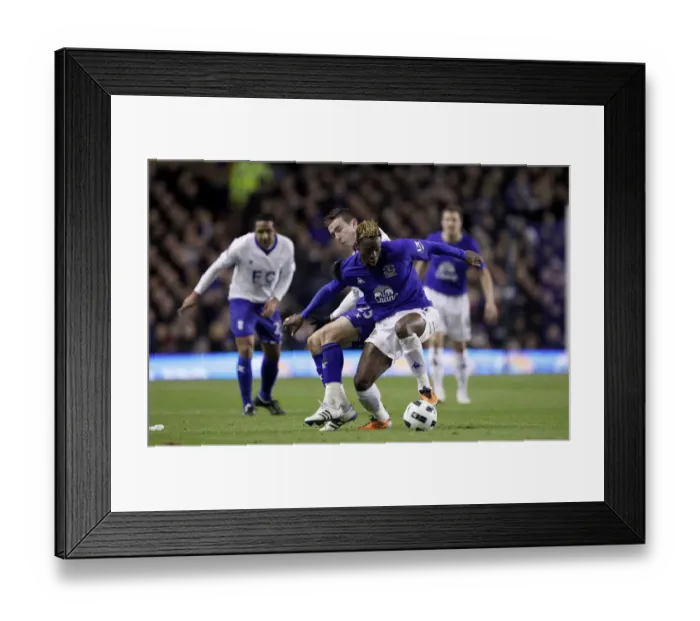 Framed Print : A Battle for Supremacy: Saha vs Mutch at Goodison Park - Everton vs Birmingham City (BPL 2011) Framed Print : A Battle for Supremacy: Saha vs Mutch at Goodison Park - Everton vs Birmingham City (BPL 2011)