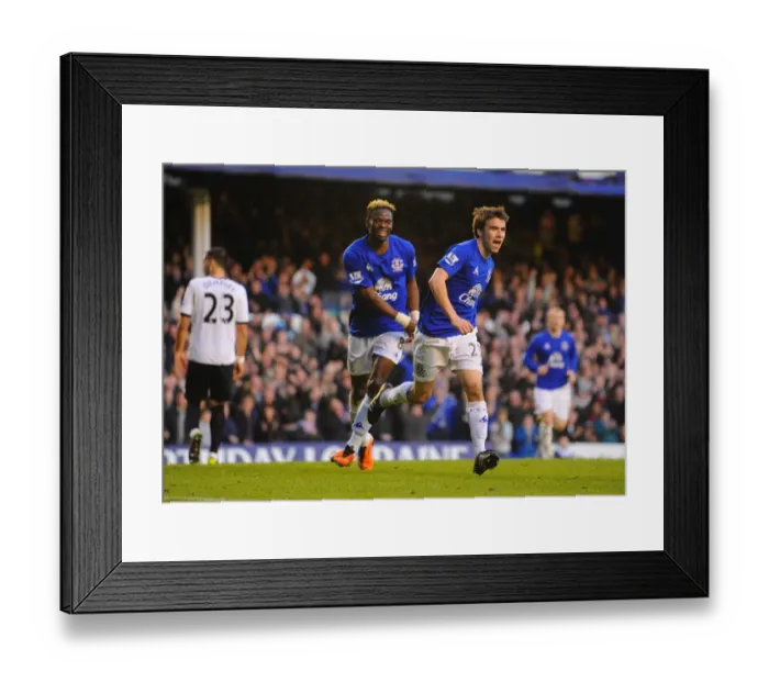 Framed Print : Seamus Coleman and Louis Saha's Euphoric Goal Celebration: Everton's Unforgettable Moment vs. Fulham (19 March 2011) Framed Print : Seamus Coleman and Louis Saha's Euphoric Goal Celebration: Everton's Unforgettable Moment vs. Fulham (19 March 2011)