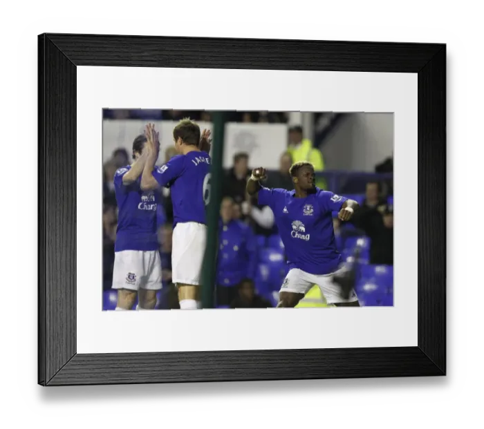 Framed Print : Everton's Louis Saha: Double Delight as He Celebrates Second Goal Against Fulham at Goodison Park (BPL 2011) Framed Print : Everton's Louis Saha: Double Delight as He Celebrates Second Goal Against Fulham at Goodison Park (BPL 2011)