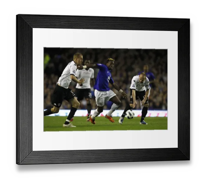 Framed Print : Everton's Louis Saha Faces Off Against Fulham's Brede Hangeland and Danny Murphy in Intense Barclays Premier League Clash (19 March 2011) Framed Print : Everton's Louis Saha Faces Off Against Fulham's Brede Hangeland and Danny Murphy in Intense Barclays Premier League Clash (19 March 2011)