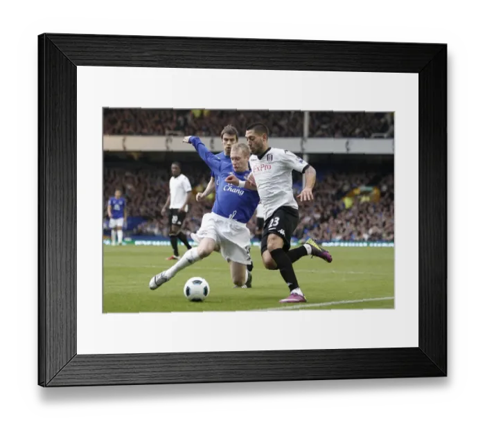 Framed Print : Battle for the Ball: Hibbert vs. Dempsey - Everton vs. Fulham, Premier League (19 March 2011) Framed Print : Battle for the Ball: Hibbert vs. Dempsey - Everton vs. Fulham, Premier League (19 March 2011)