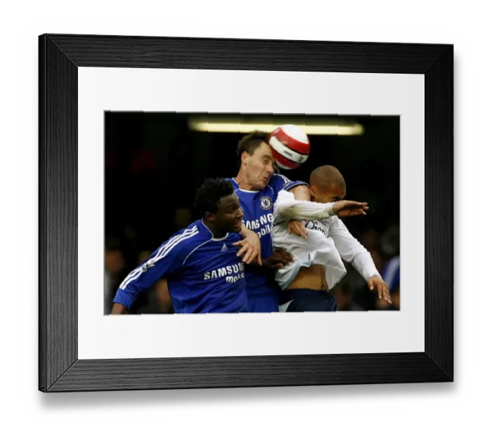 Framed Print : Chelseas Terry challenges Evertons Vaughan during their English Premier League soccer match Framed Print : Chelseas Terry challenges Evertons Vaughan during their English Premier League soccer match