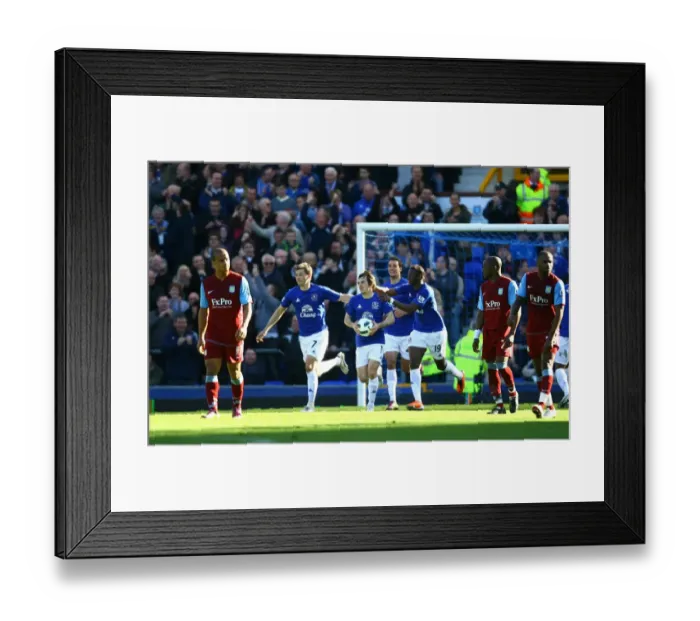 Framed Print : Leighton Baines Scores Penalty: Everton's Second Goal vs Aston Villa (04.04.2011) Framed Print : Leighton Baines Scores Penalty: Everton's Second Goal vs Aston Villa (04.04.2011)