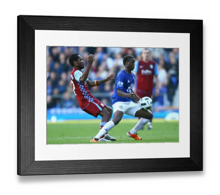 Framed Print : Intense Battle for Possession: Magaye Gueye vs Jean Makoun (Everton vs Aston Villa, Barclays Premier League, Goodison Park, 04 April 2011) Framed Print : Intense Battle for Possession: Magaye Gueye vs Jean Makoun (Everton vs Aston Villa, Barclays Premier League, Goodison Park, 04 April 2011)