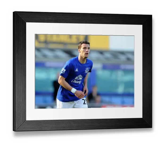 Framed Print : April Showers: Apostolos Vellios Scores for Everton Against Aston Villa in the Premier League (2011)