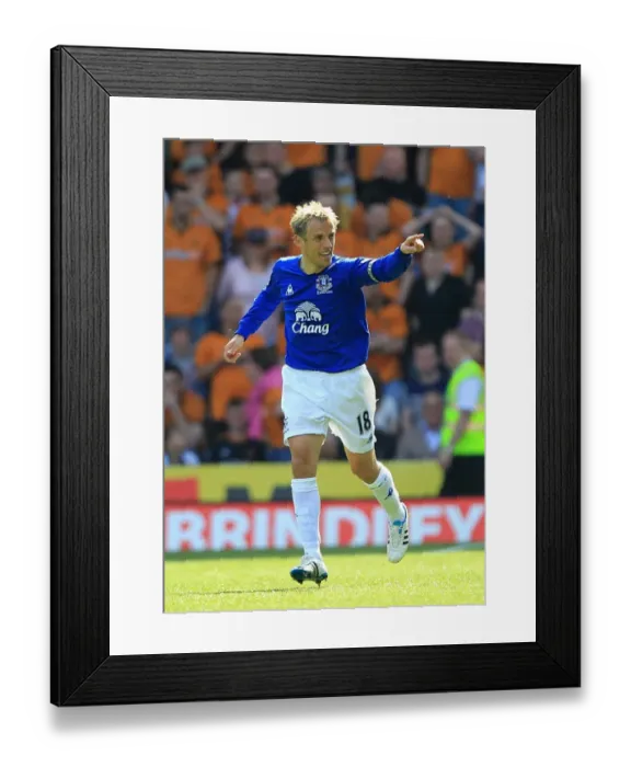 Framed Print : Everton's Double Victory: Phil Neville's Goal Secures Premier League Win Against Wolverhampton Wanderers (09 April 2011) Framed Print : Everton's Double Victory: Phil Neville's Goal Secures Premier League Win Against Wolverhampton Wanderers (09 April 2011)