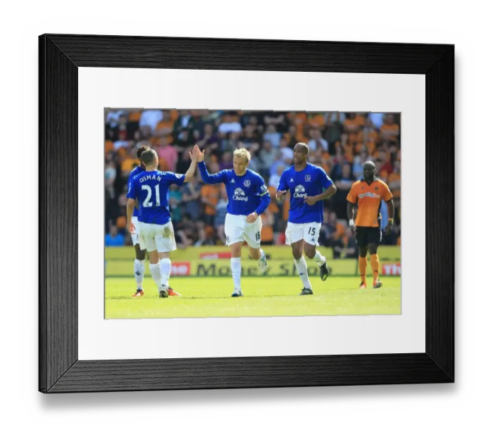 Framed Print : Phil Neville's Double Strike: Everton Celebrates Over Wolverhampton Wanderers Framed Print : Phil Neville's Double Strike: Everton Celebrates Over Wolverhampton Wanderers