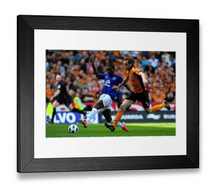 Framed Print : Battle for the Ball: Stearman vs. Gueye - Everton vs. Wolverhampton Wanderers in the Premier League (09 April 2011) Framed Print : Battle for the Ball: Stearman vs. Gueye - Everton vs. Wolverhampton Wanderers in the Premier League (09 April 2011)