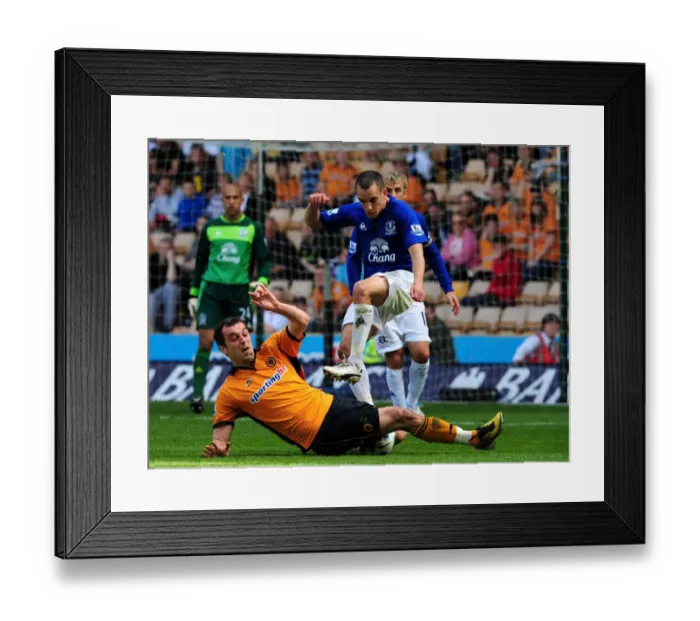 Framed Print : Battle for the Ball: Milijas vs Osman - Wolverhampton Wanderers vs Everton (Barclays Premier League, 09 April 2011) Framed Print : Battle for the Ball: Milijas vs Osman - Wolverhampton Wanderers vs Everton (Barclays Premier League, 09 April 2011)