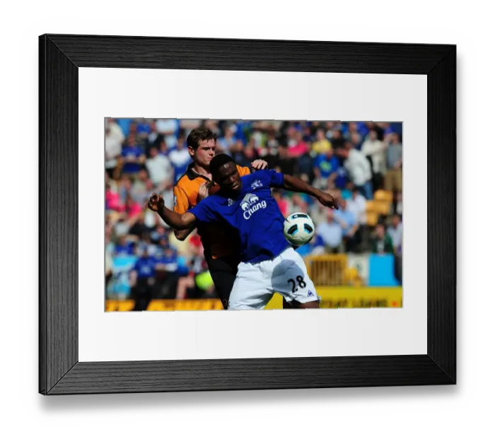 Framed Print : Battle for the Ball: Anichebe vs. Stearman - Everton vs. Wolverhampton Wanderers in the Premier League (09 April 2011) Framed Print : Battle for the Ball: Anichebe vs. Stearman - Everton vs. Wolverhampton Wanderers in the Premier League (09 April 2011)