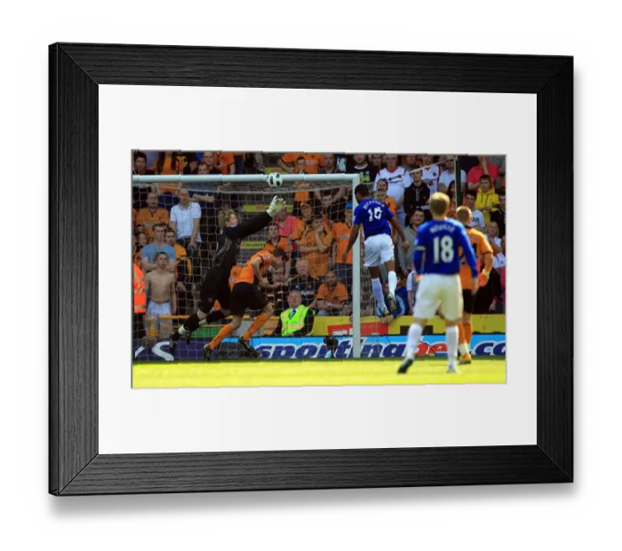 Framed Print : Jermaine Beckford Scores the First Goal: Everton's Triumph at Wolverhampton Wanderers in the Barclays Premier League (09 April 2011) Framed Print : Jermaine Beckford Scores the First Goal: Everton's Triumph at Wolverhampton Wanderers in the Barclays Premier League (09 April 2011)