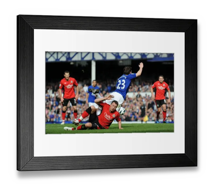 Framed Print : Seamus Coleman Fouled by Phil Jones: Everton's Penalty Drama vs. Blackburn Rovers (BPL, 16 April 2011)