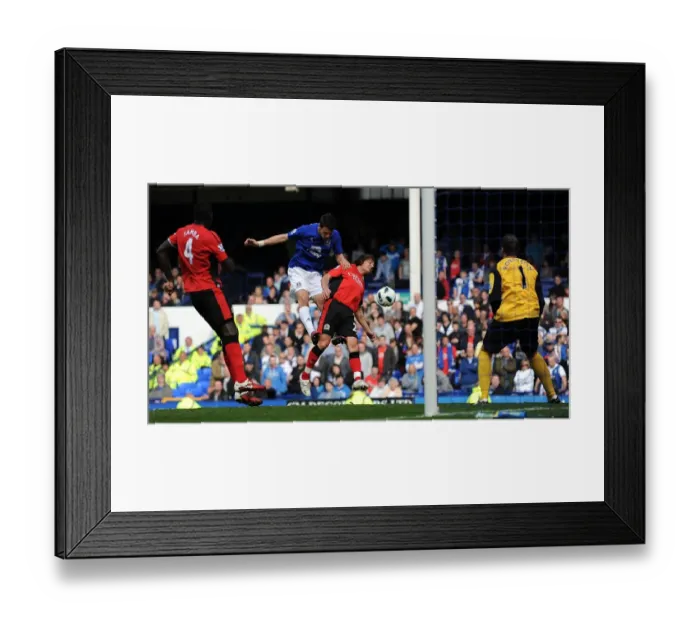 Framed Print : Everton's Vellios Goes for Glory: Thrilling Headed Attempt vs. Blackburn Rovers in Premier League (16 April 2011, Goodison Park) Framed Print : Everton's Vellios Goes for Glory: Thrilling Headed Attempt vs. Blackburn Rovers in Premier League (16 April 2011, Goodison Park)