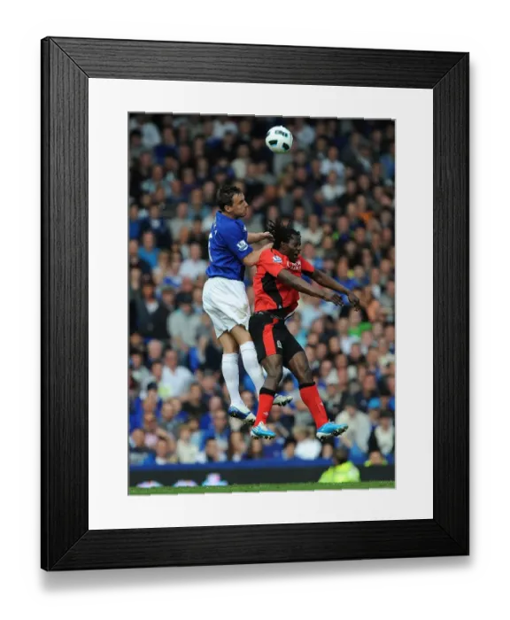 Framed Print : Aerial Battle at Goodison Park: Jagielka vs Mwaruwari (Everton vs Blackburn Rovers, BPL, 16 April 2011) Framed Print : Aerial Battle at Goodison Park: Jagielka vs Mwaruwari (Everton vs Blackburn Rovers, BPL, 16 April 2011)