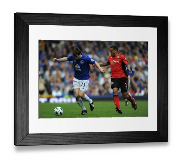 Framed Print : Intense Battle for Ball Possession: Seamus Coleman vs. Jermaine Jones - Everton vs. Blackburn Rovers, Barclays Premier League (April 16, 2011, Goodison Park) Framed Print : Intense Battle for Ball Possession: Seamus Coleman vs. Jermaine Jones - Everton vs. Blackburn Rovers, Barclays Premier League (April 16, 2011, Goodison Park)