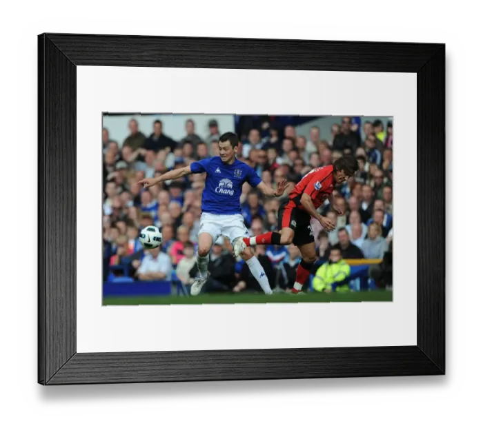 Framed Print : Battle for the Ball: Bilyaletdinov vs. Salgado - Everton vs. Blackburn Rovers, Premier League (16 April 2011, Goodison Park) Framed Print : Battle for the Ball: Bilyaletdinov vs. Salgado - Everton vs. Blackburn Rovers, Premier League (16 April 2011, Goodison Park)