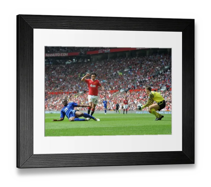 Framed Print : Determined Anichebe Thwarted by Van der Sar: Manchester United vs. Everton, Premier League (April 2011) Framed Print : Determined Anichebe Thwarted by Van der Sar: Manchester United vs. Everton, Premier League (April 2011)