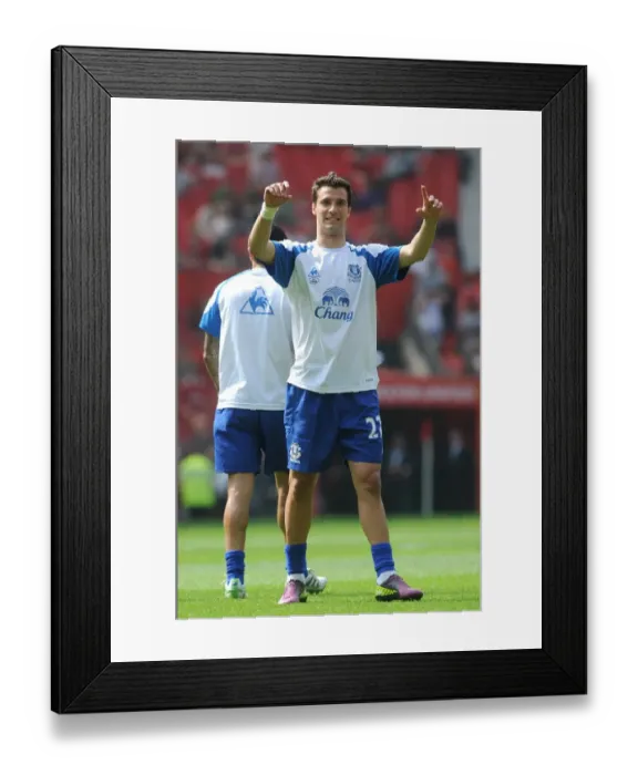 Framed Print : Apostolos Vellios vs. Manchester United: Everton's Brave Face-Off at Old Trafford (Barclays Premier League, 23 April 2011) Framed Print : Apostolos Vellios vs. Manchester United: Everton's Brave Face-Off at Old Trafford (Barclays Premier League, 23 April 2011)
